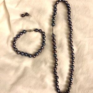 freshwater pearl necklace, bracelet, and earrings